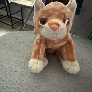 Adorable Brown and White Stuffed Cat Toy
